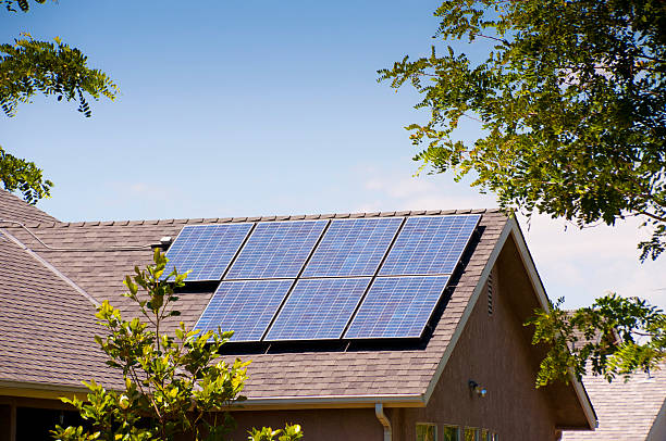 residential solar panels on back rooftop.