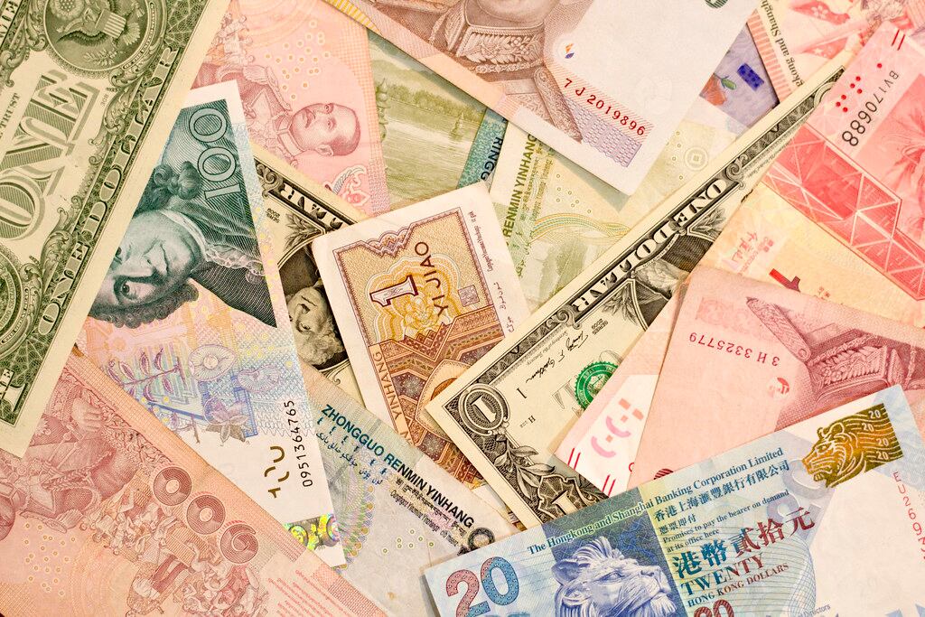 global currencies fluctuate amid economic data, policy expectations
