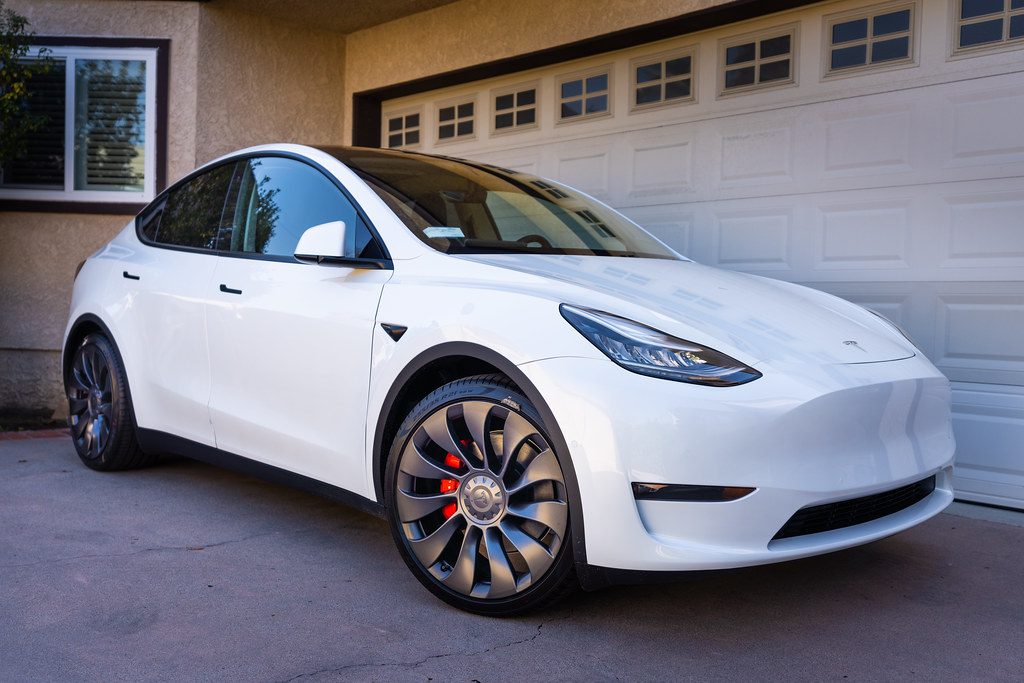 tesla completes first fully driverless car delivery